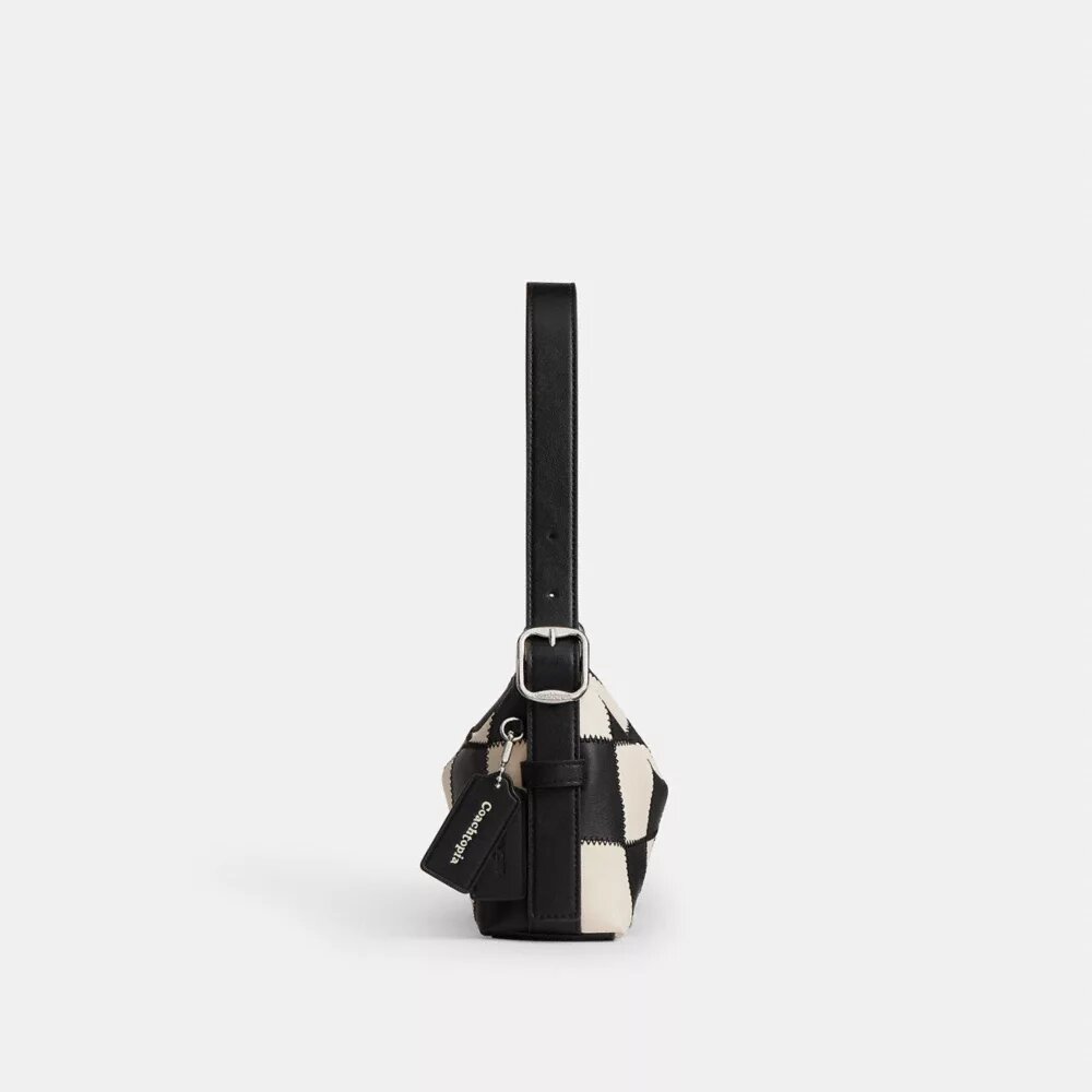 Alter/Ego Kleine, locker sitzende Schultertasche
