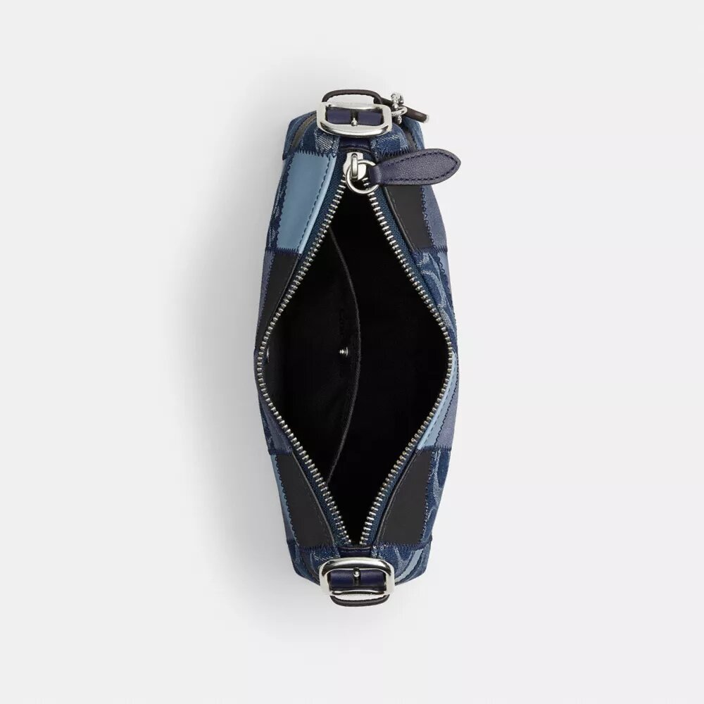 Alter/Ego Kleine, locker sitzende Schultertasche