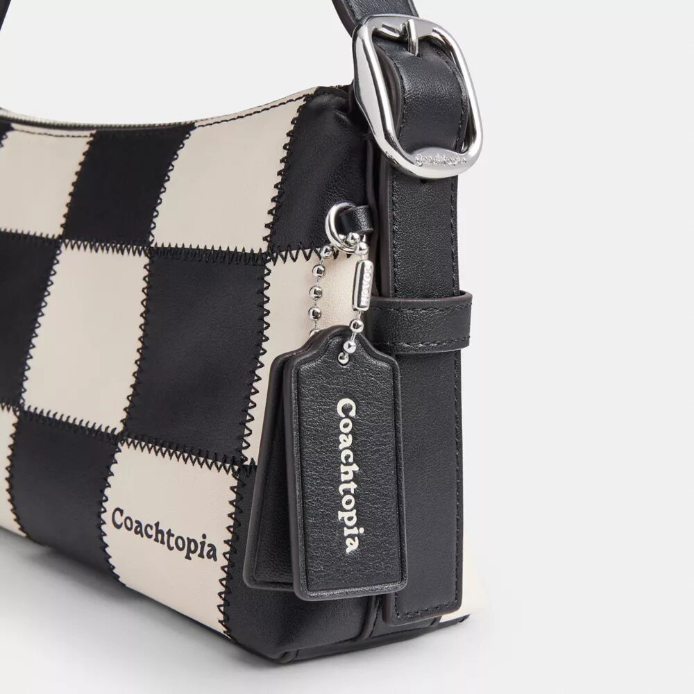 Alter/Ego Kleine, locker sitzende Schultertasche
