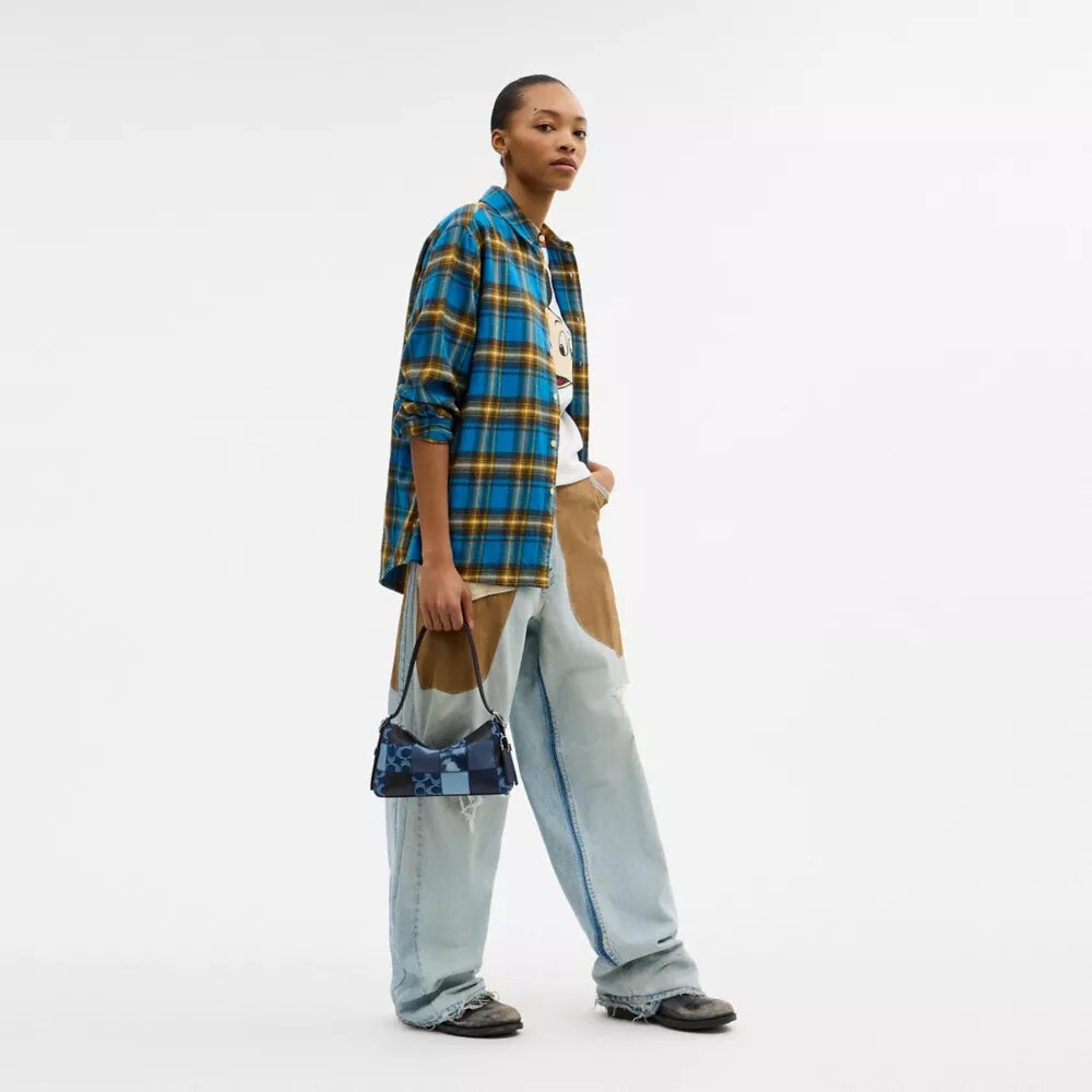 Alter/Ego Kleine, locker sitzende Schultertasche