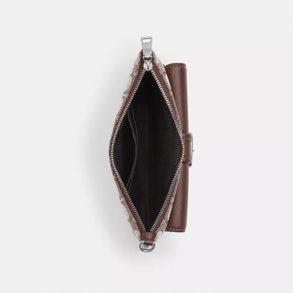 Ashton-Handgelenktasche aus charakteristischem Jacquard