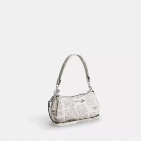 Ashton-Schultertasche mit Zeitungsdruck