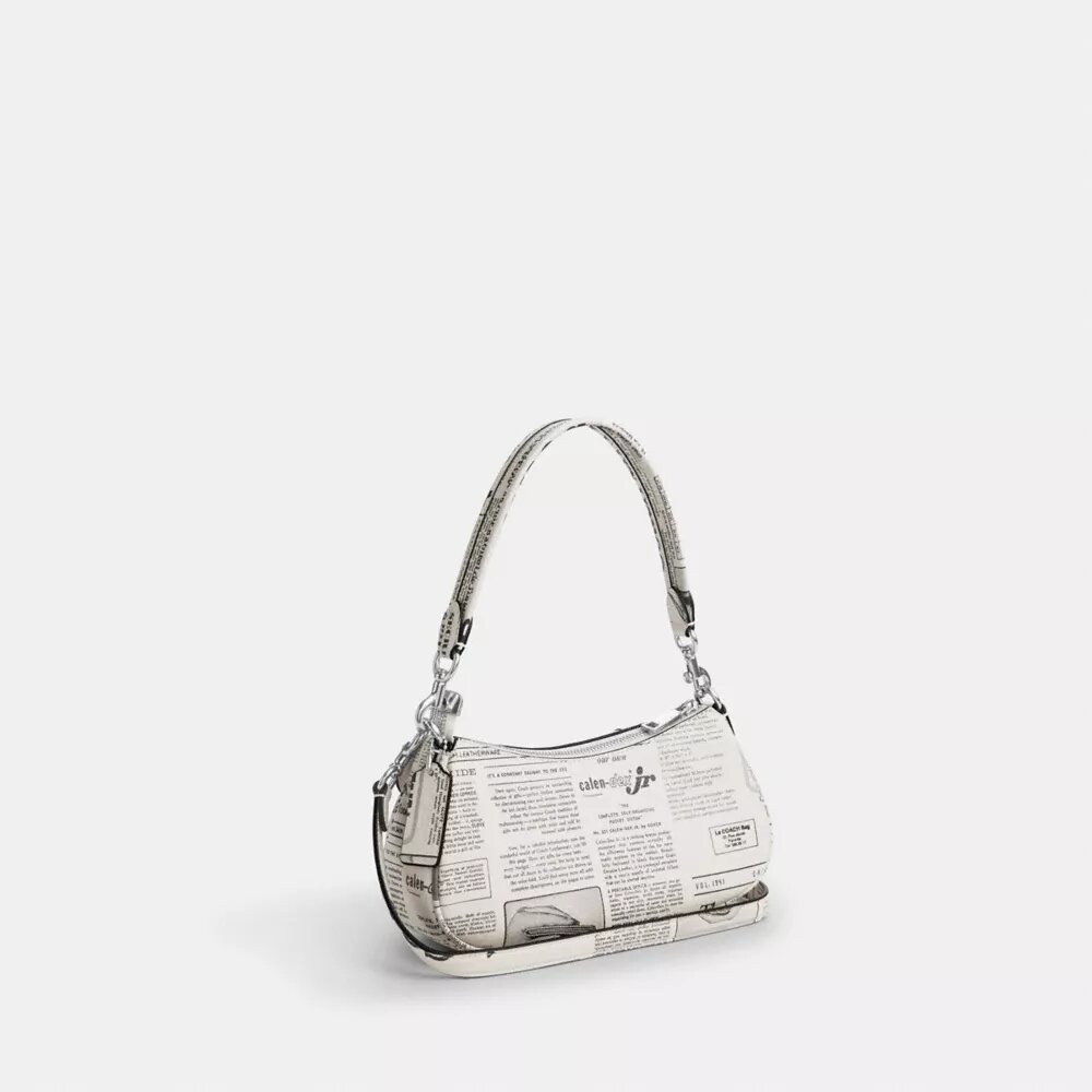 Ashton-Schultertasche mit Zeitungsdruck