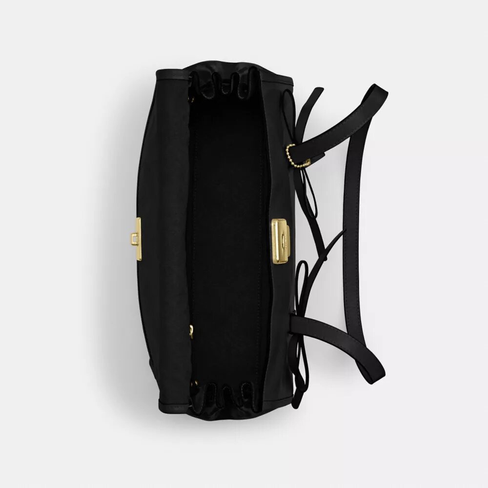Bridget-Schultertasche mit Klappe und Schleifen