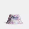 Bucket-Hut mit „Coach Script“-Blumenprint
