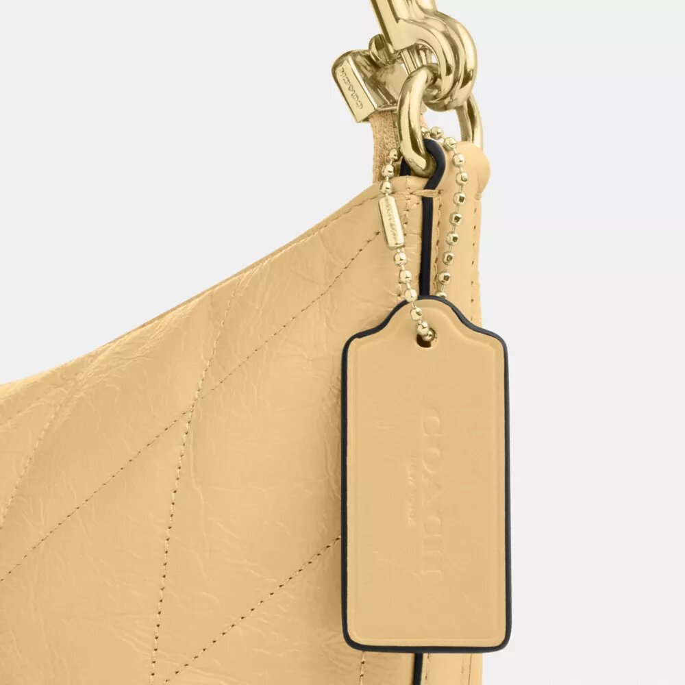 Caitlin-Schultertasche mit Steppung