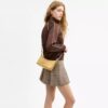 Caitlin-Schultertasche mit Steppung