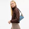 Caitlin-Schultertasche mit Steppung
