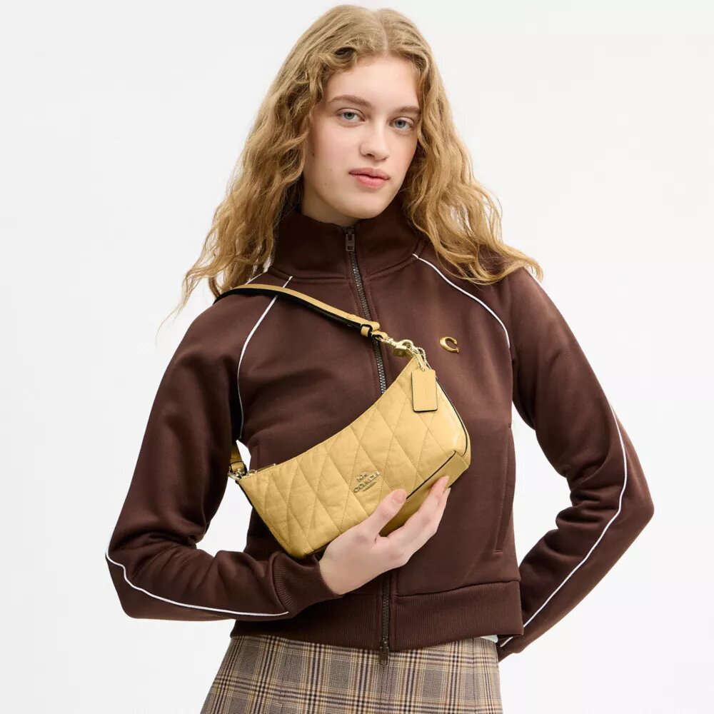 Caitlin-Schultertasche mit Steppung