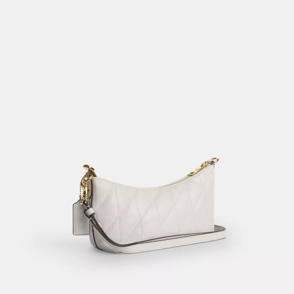 Caitlin-Schultertasche mit Steppung und Anhänger