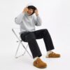 Clogs mit Schnalle im charakteristischen Design