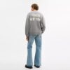 Coach-Strickjacke