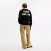 Coach-Strickjacke