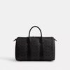 Compass Bag 35 aus Signature Canvas