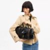Compass Bag 35 aus Used-Leder mit Anhängern
