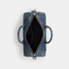 Compass-Tasche 35 aus regenerativem Baumwoll-Denim mit Anhängern