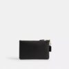 Disney X Coach Essential – kleine Handgelenktasche mit Pluto