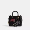 Disney X Coach Rogue-Taschen 25 mit Pluto