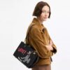 Disney X Coach Rogue-Taschen 25 mit Pluto