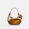 Emily-Schultertasche aus Haarkalbsleder mit Kuhmuster