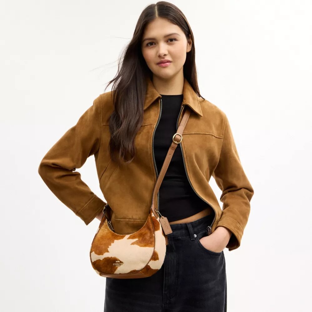 Emily-Schultertasche aus Haarkalbsleder mit Kuhmuster