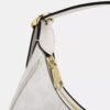 Emily-Schultertasche aus Signature Canvas