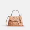 Emory-Handtasche mit Tragegriff und Blumenapplikation
