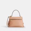 Emory-Handtasche mit Tragegriff und Blumenapplikation