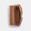 Emory-Handtasche mit Tragegriff und Blumenapplikation