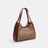 Erin-Schultertasche aus Signature Canvas