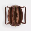 Erin-Schultertasche aus Signature Canvas