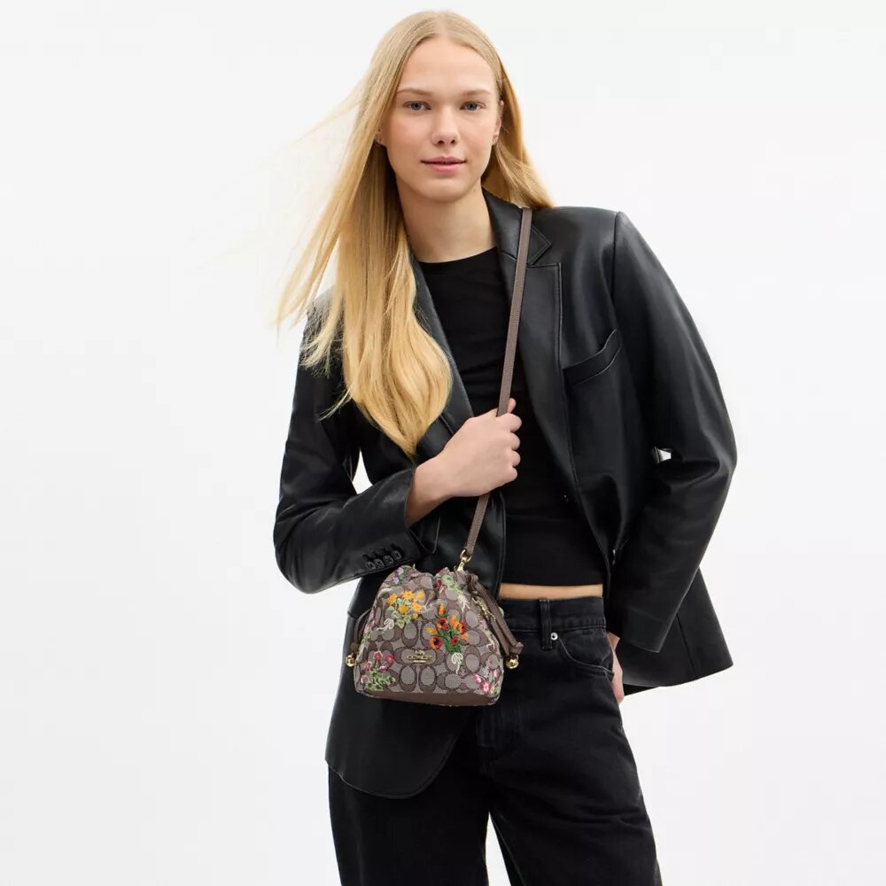 Faye Mini-Kordelzugtasche aus charakteristischem Jacquard mit Blumenstickerei