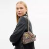 Faye Mini-Kordelzugtasche aus charakteristischem Jacquard mit Blumenstickerei