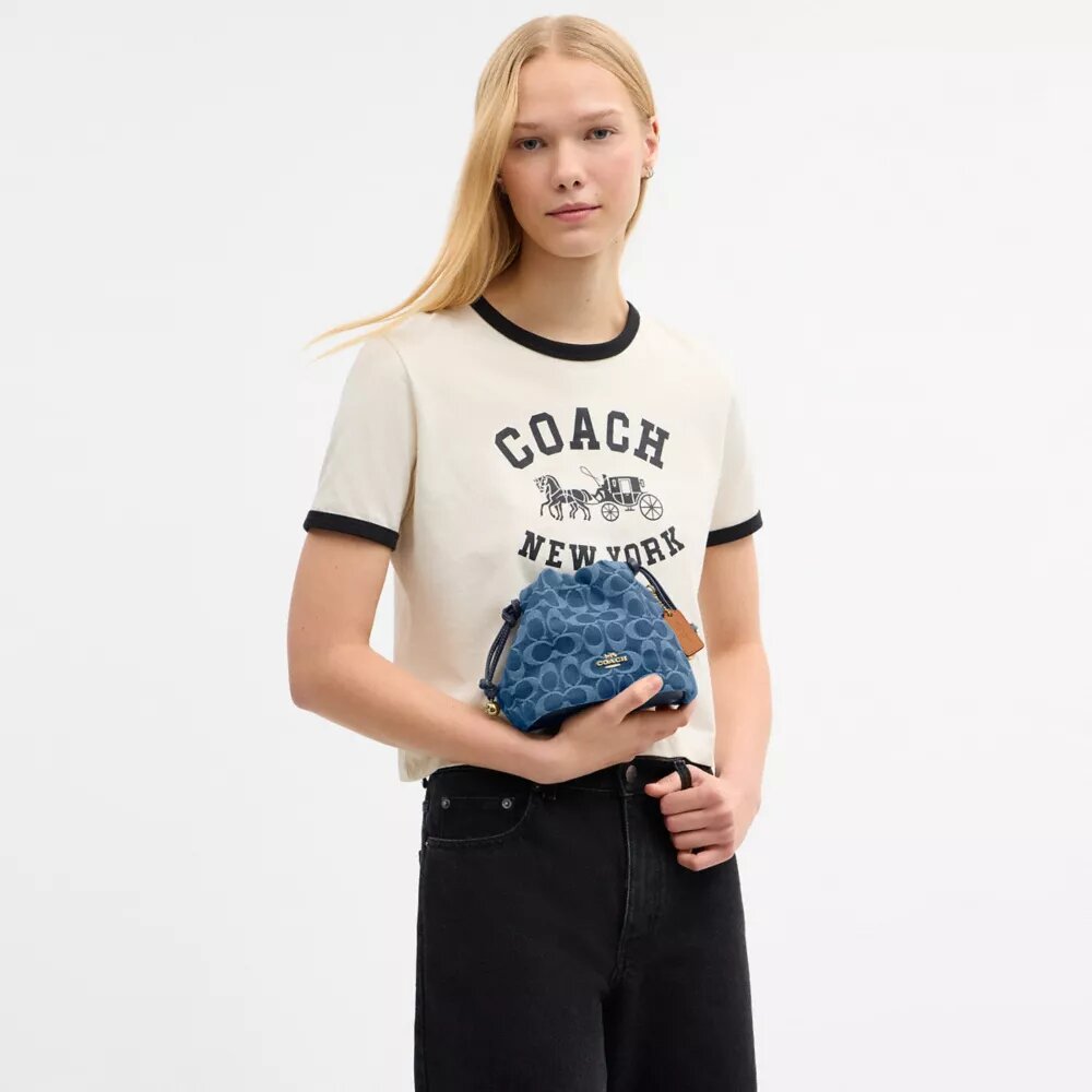 Faye Mini-Kordelzugtasche aus Signature-Denim