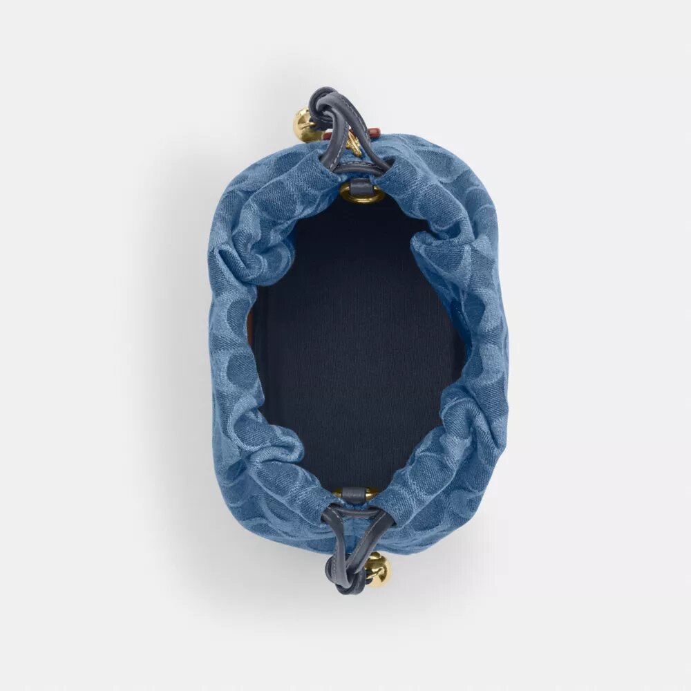 Faye Mini-Kordelzugtasche aus Signature-Denim