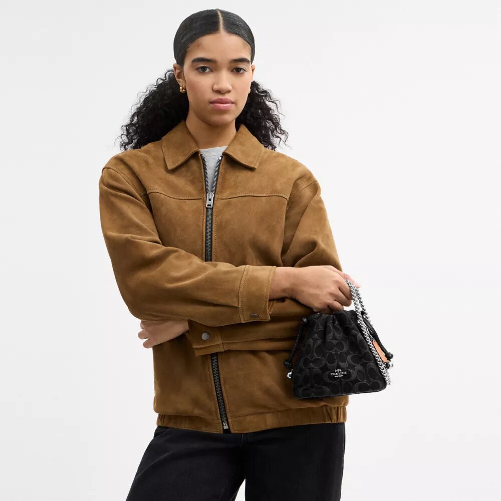 Faye Mini-Kordelzugtasche aus Signature-Denim