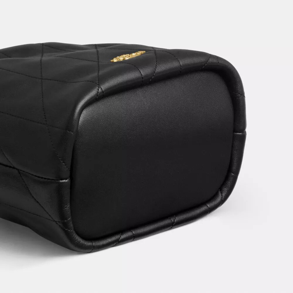 Faye Mini-Kordelzugtasche mit Steppung