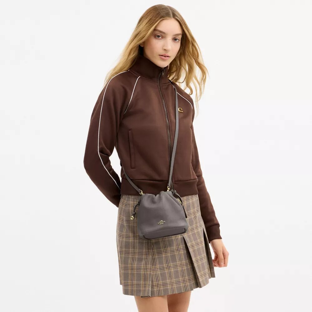 Faye Mini-Kordelzugtasche mit Steppung