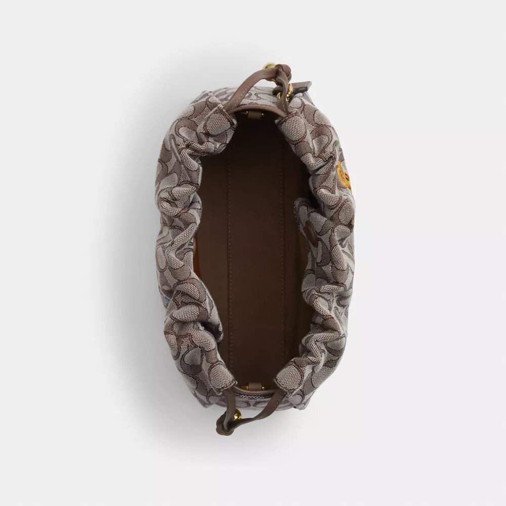 Faye-Schultertasche aus charakteristischem Jacquard mit Blumenstickerei