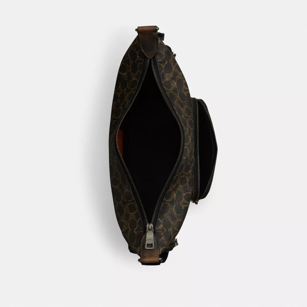 Finn-Umhängetasche mit Taschen aus dem beliebten Signature Canvas