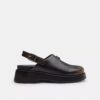 Geformte C-Plateau-Clogs aus „Loved“-Leder