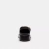 Geformte C-Plateau-Clogs aus „Loved“-Leder