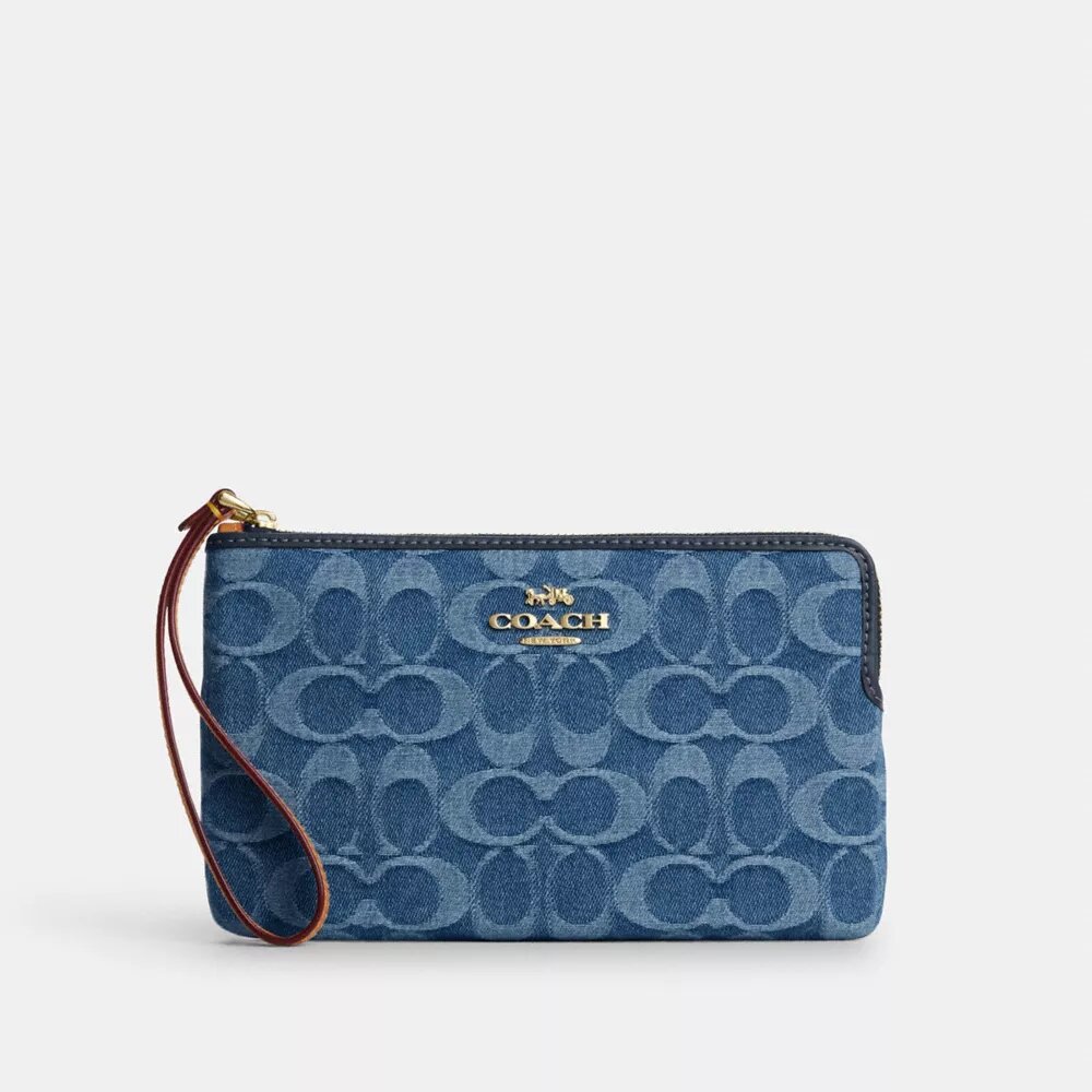 Große Handgelenktasche mit Reißverschluss an der Ecke aus charakteristischem Denim