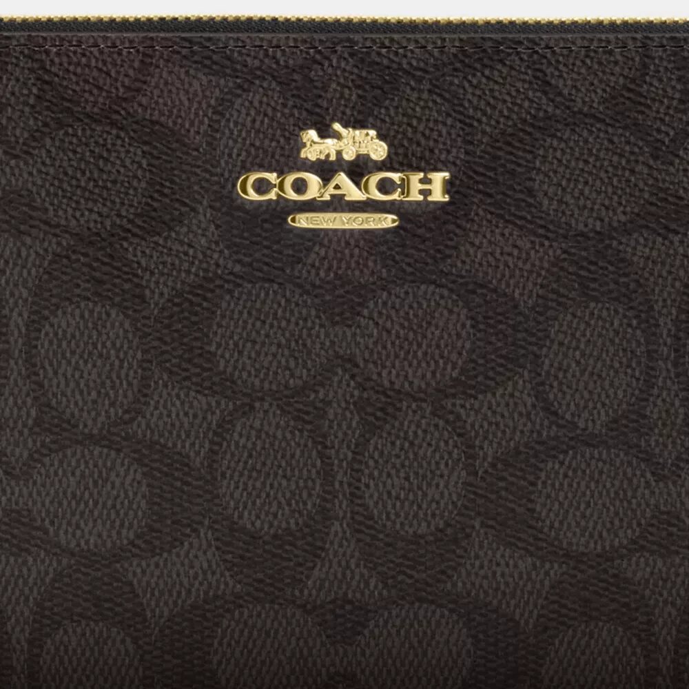 Große Handgelenktasche mit Reißverschluss an der Ecke aus Signature Canvas
