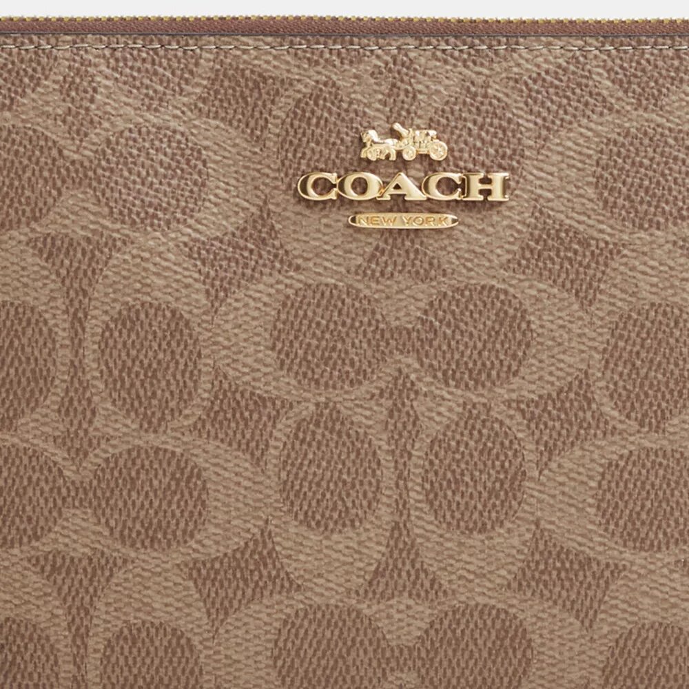 Große Handgelenktasche mit Reißverschluss an der Ecke aus Signature Canvas