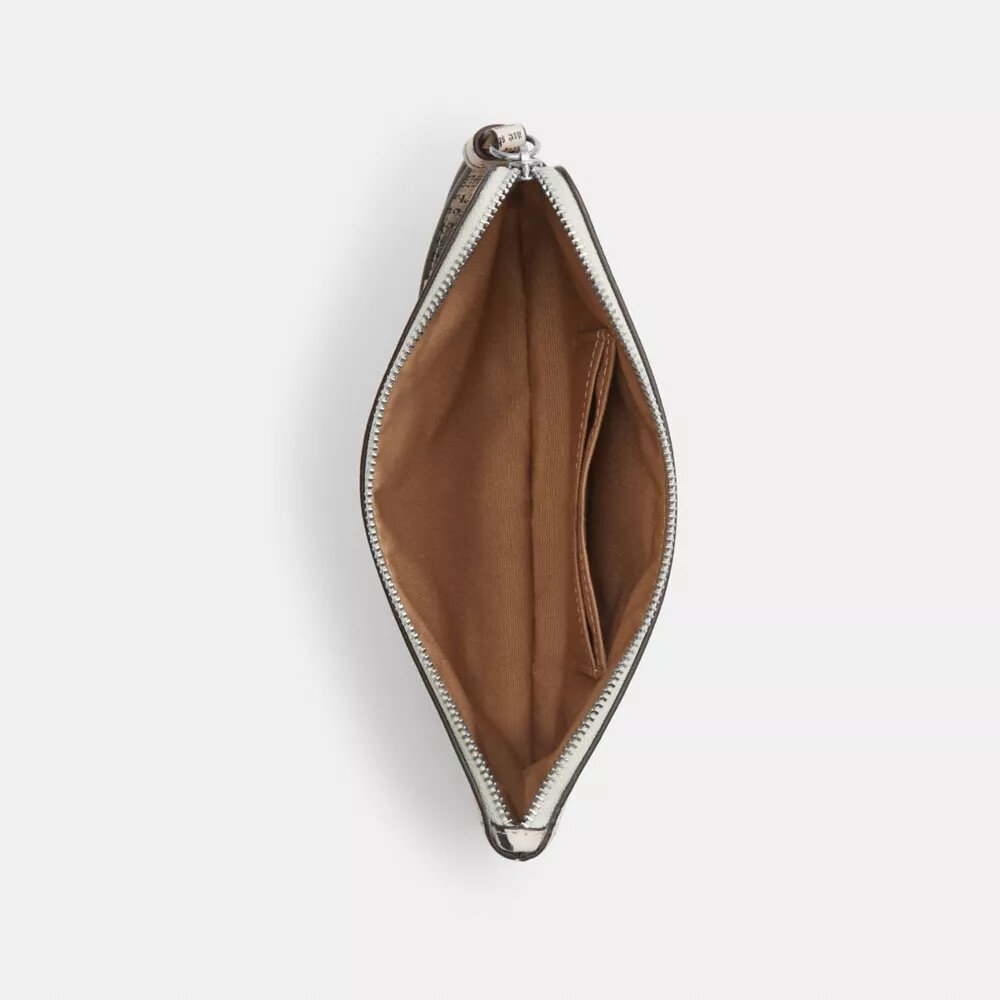 Große Handgelenktasche mit Reißverschluss an der Ecke und Zeitungsdruck
