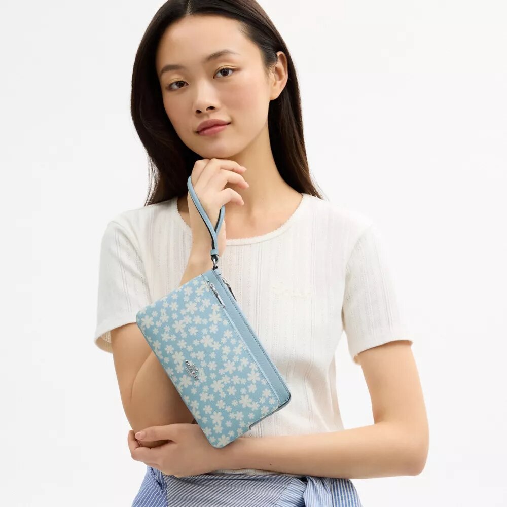 Handgelenktasche mit doppeltem Reißverschluss und Blumenmuster
