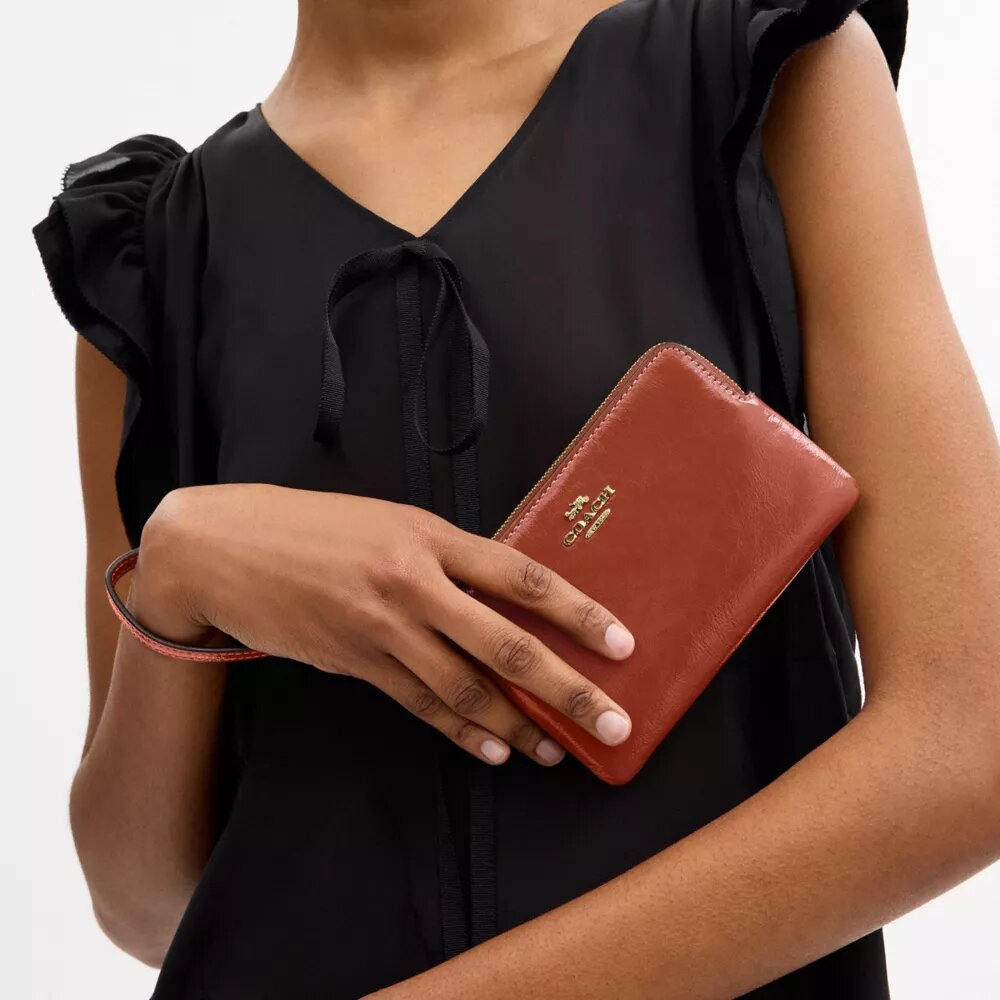 Handgelenktasche mit Reißverschluss an der Ecke