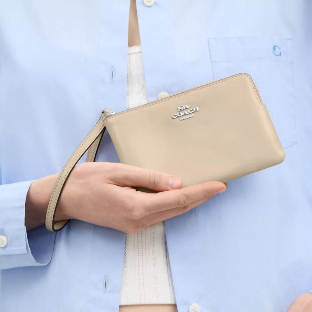 Handgelenktasche mit Reißverschluss an der Ecke