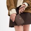 Handgelenktasche mit Reißverschluss an der Ecke